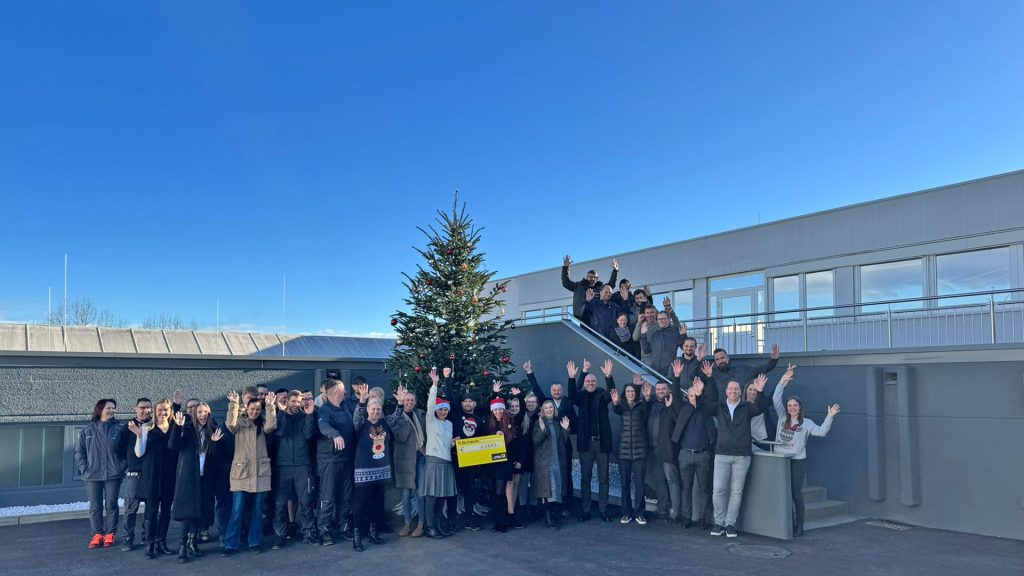 PAYER employees with Christmas tree